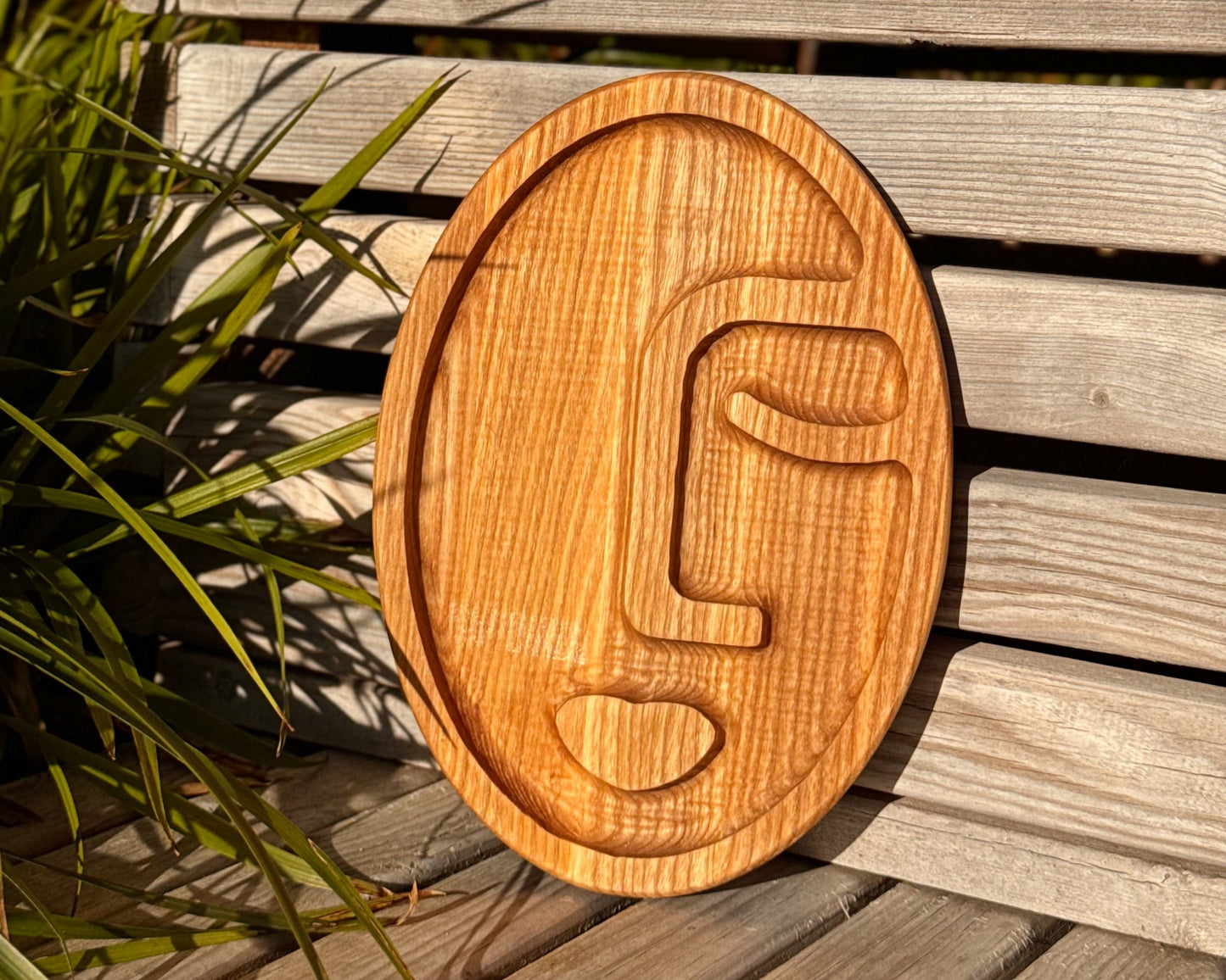 Ansiktsformad bricka